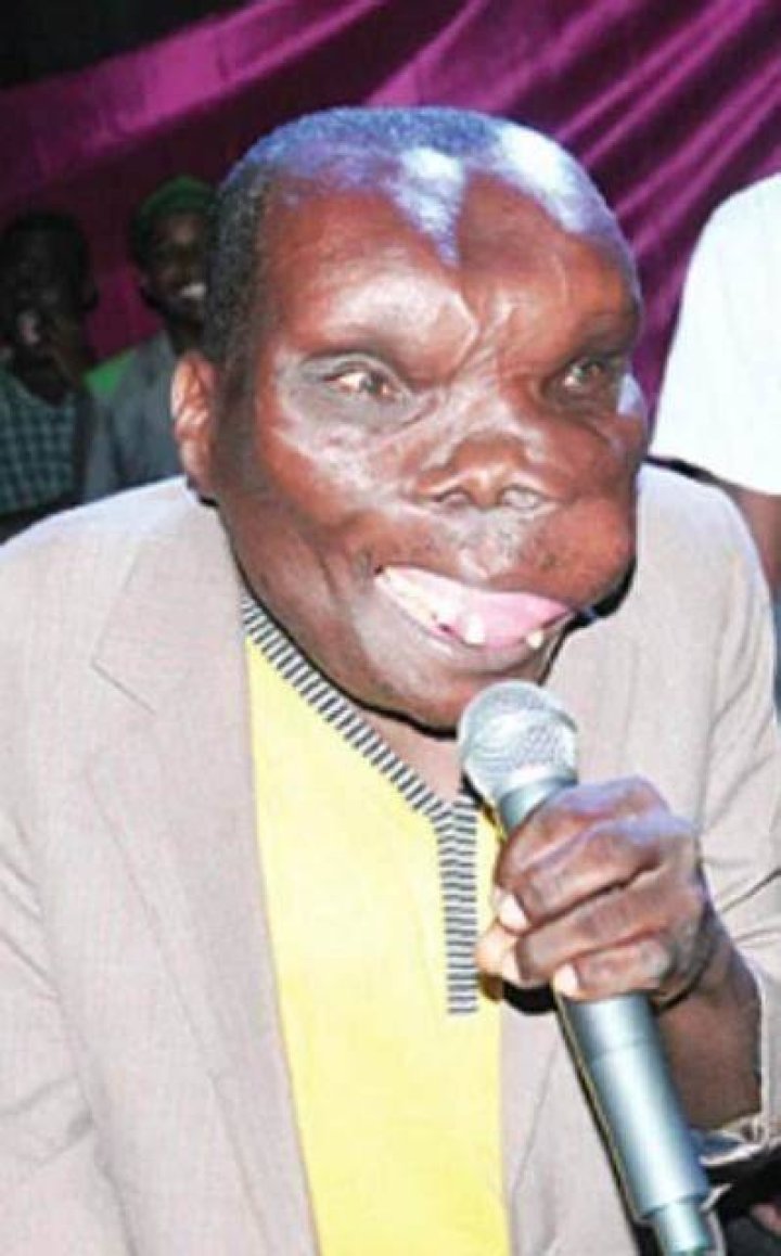 A picture of Godfrey Baguma in a green t-shirt (L). Godfrey Baguma posing for a picture in a red suit (R). A picture of Godfrey Baguma in a green t-shirt (L). Godfrey Baguma posing for a picture in a red suit (R).