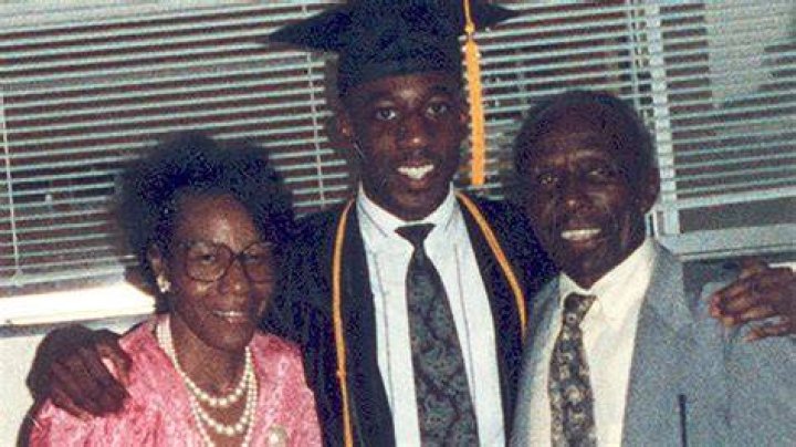 Raphael Warnock with his parents while he graduated from Columbia University.